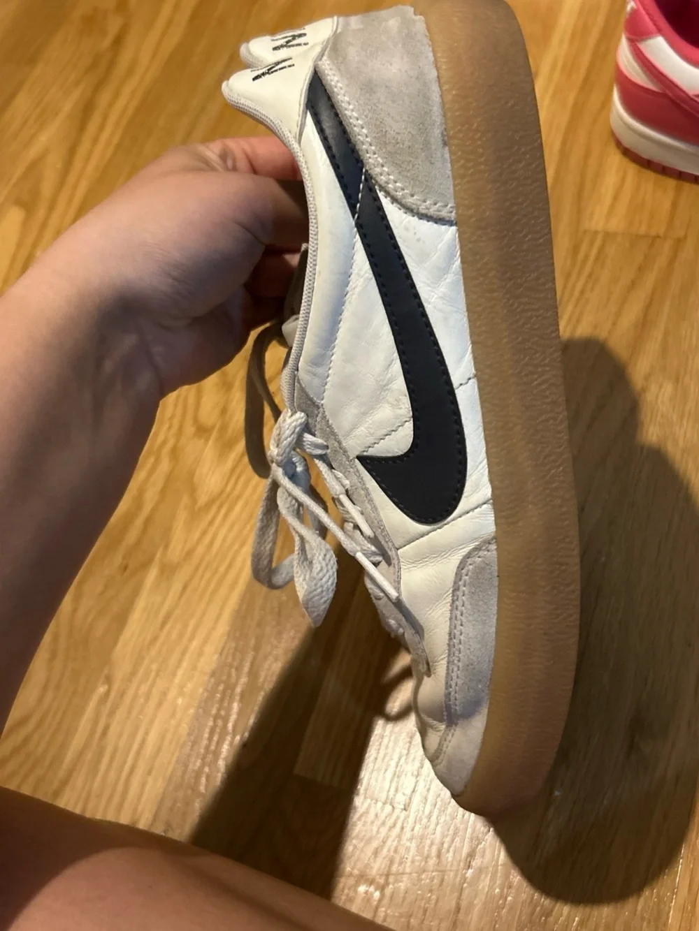 Nike Women's White Sneakers with Black Swoosh